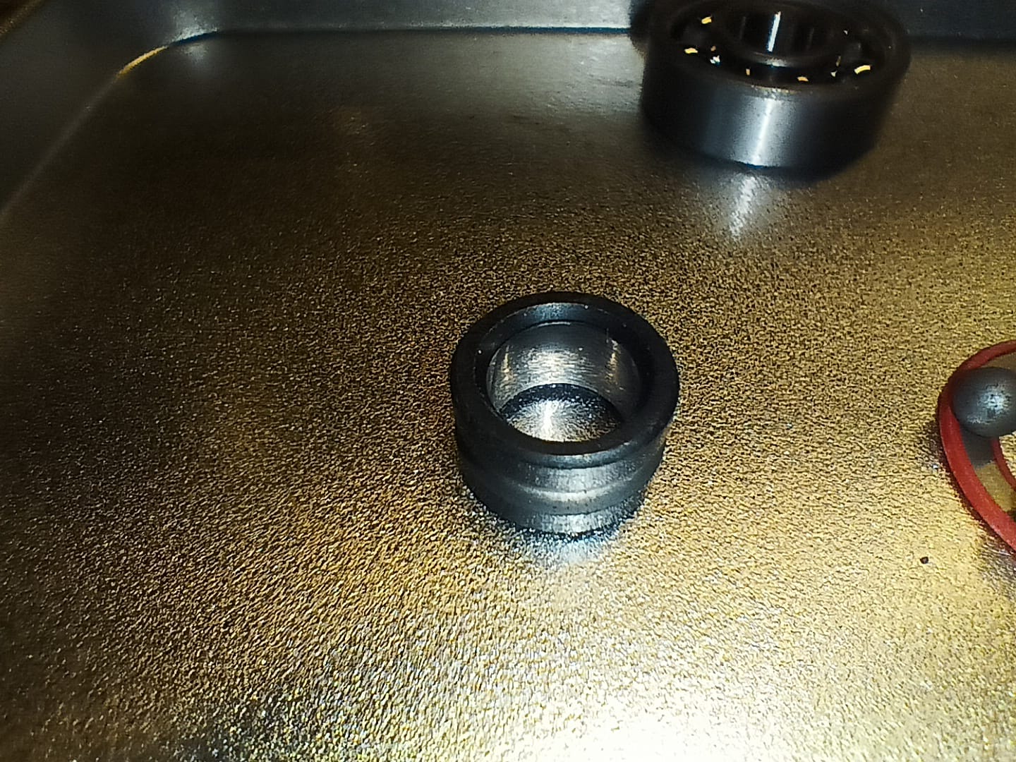 Skateboard wheels have 2 bearings each. These bearings are separated with a spacer.